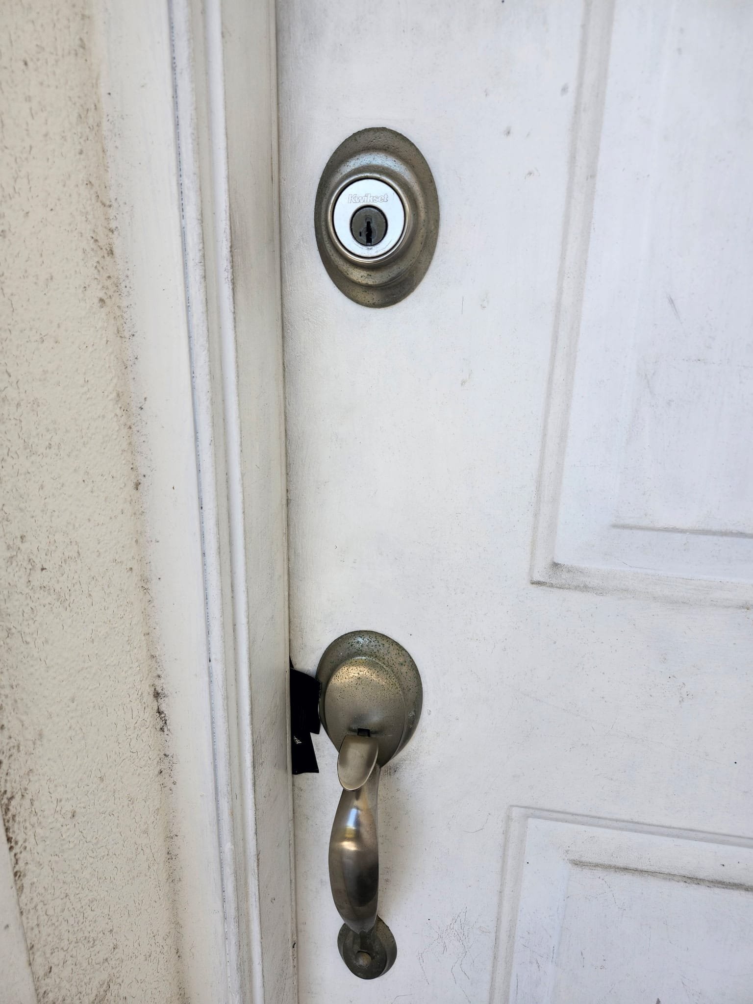 Old residential deadbolt before replacement in Cooper City, Florida