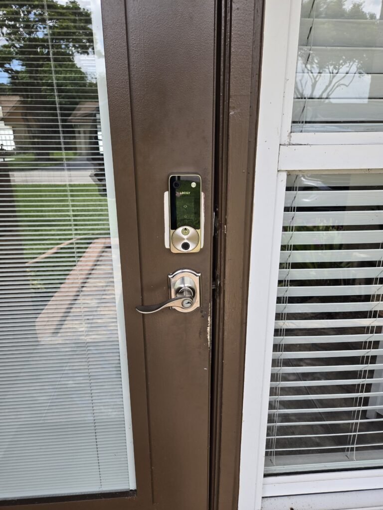 Lockly smart lock installed on residential door in Plantation, Florida