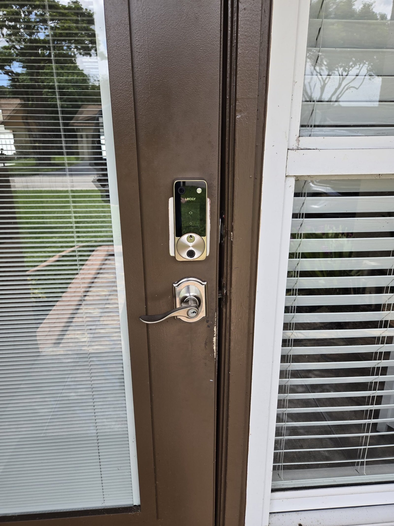 Lockly smart lock installed on residential door in Plantation, Florida