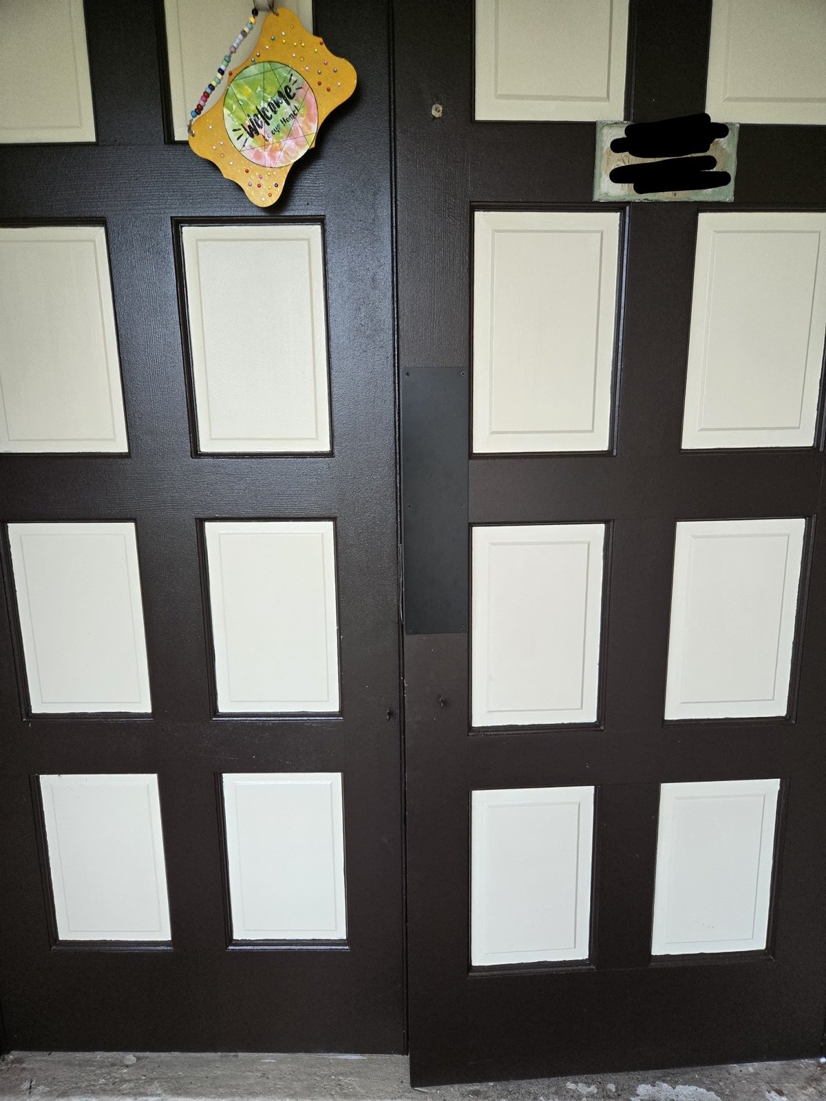 Boca Raton double doors during conversion from old mortise hardware to a modern lock system
