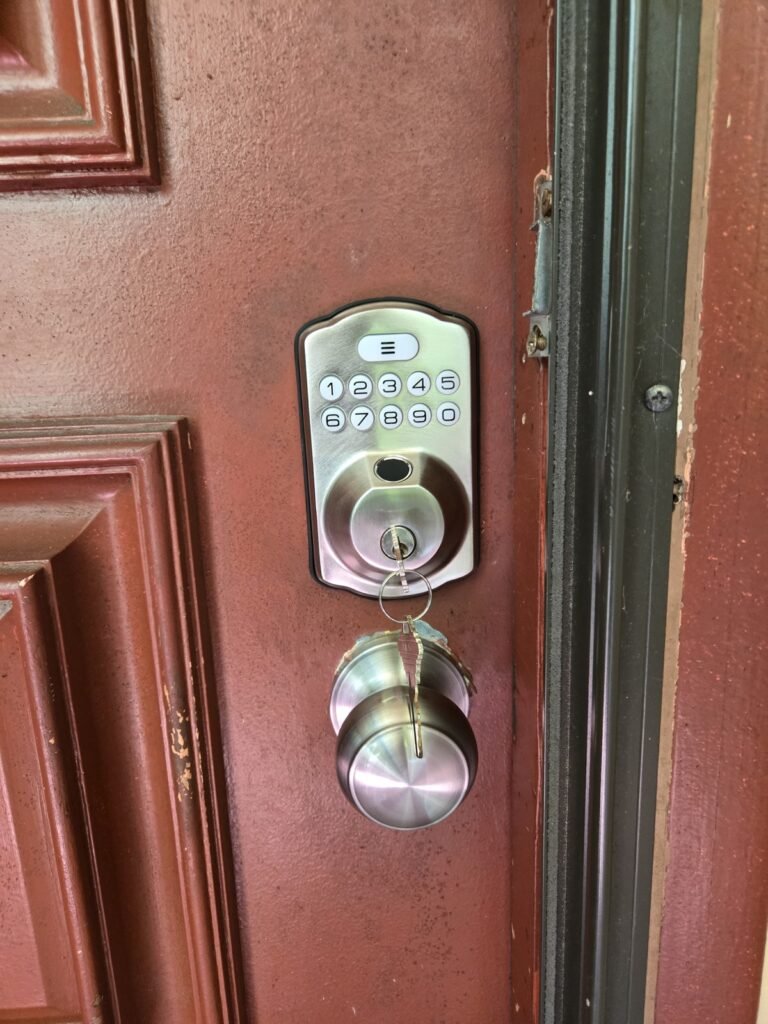 New keypad deadbolt and door knob after residential lock installation