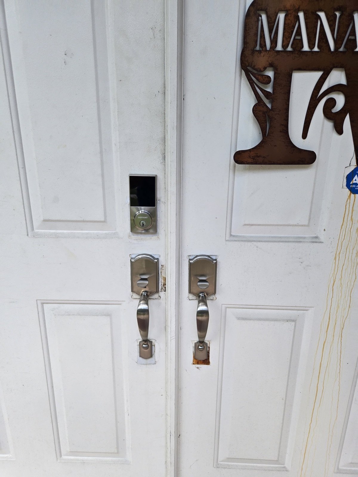 Authorized residential smart lock installation on a South Florida front door