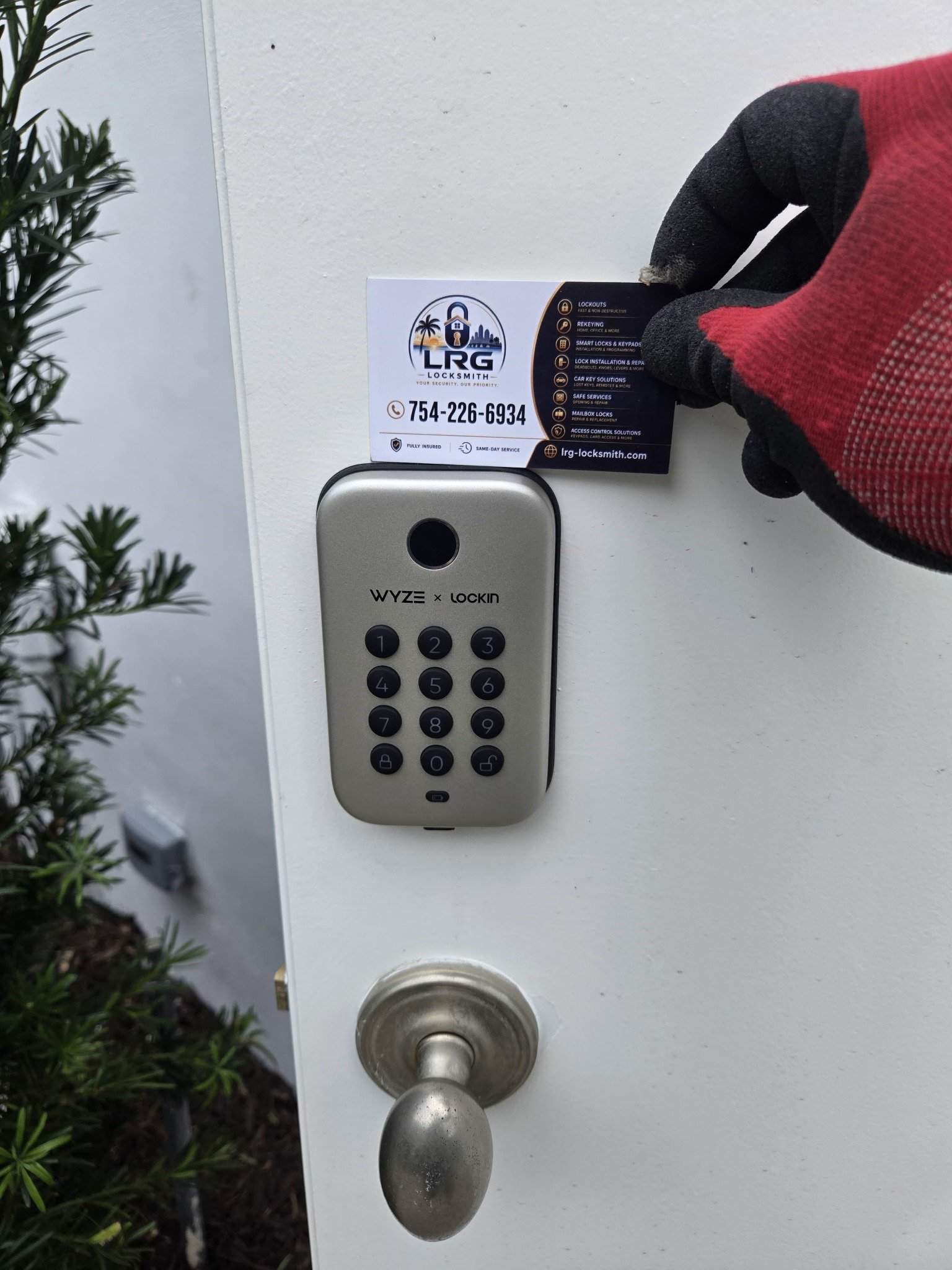 Wyze Lock Bolt keypad smart lock installed on a garage entry door by LRG Locksmith
